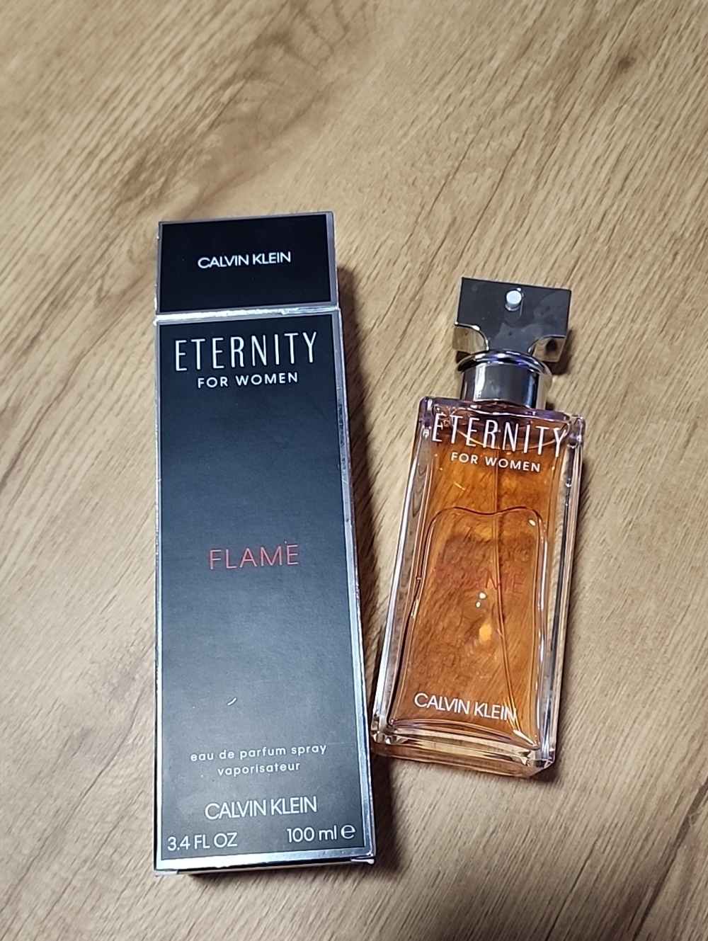 Calvin Klein Eternity Flame – Amber Fragrance Bottle with Black Box
